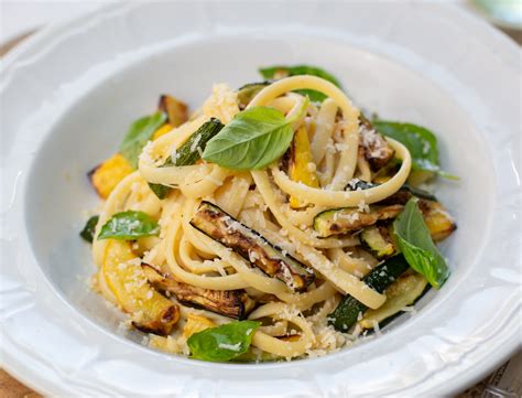  Spaghetti alla Nerano! A dish bursting with sweet, creamy fior di latte cheese and bright, fresh zucchini blossoms.